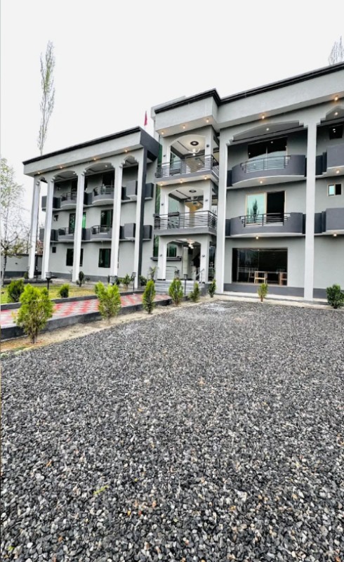 Balconies on the three storey exterior of Arcadian Resort Skardu